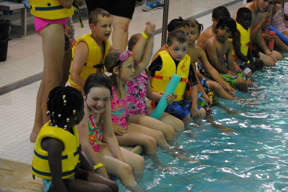Kids swimming Kids playing at Sussex County YMCA summer day camp